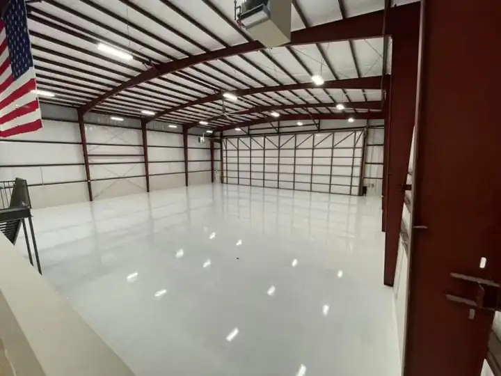 High-gloss white epoxy in an aircraft hangar