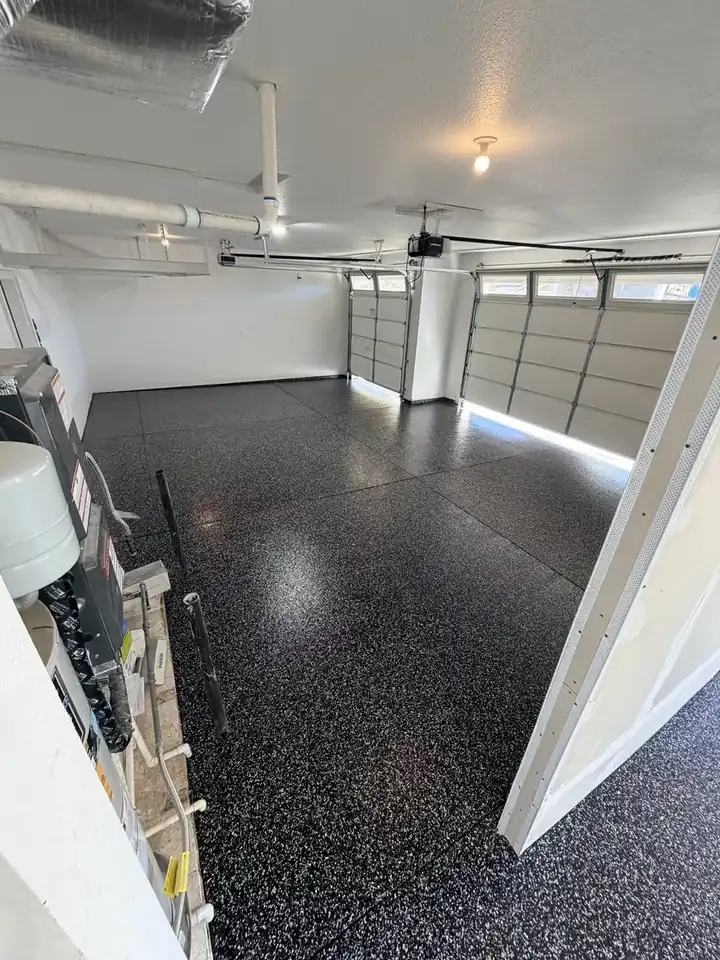 Charcoal Raven flake garage floor installed by Resin4U